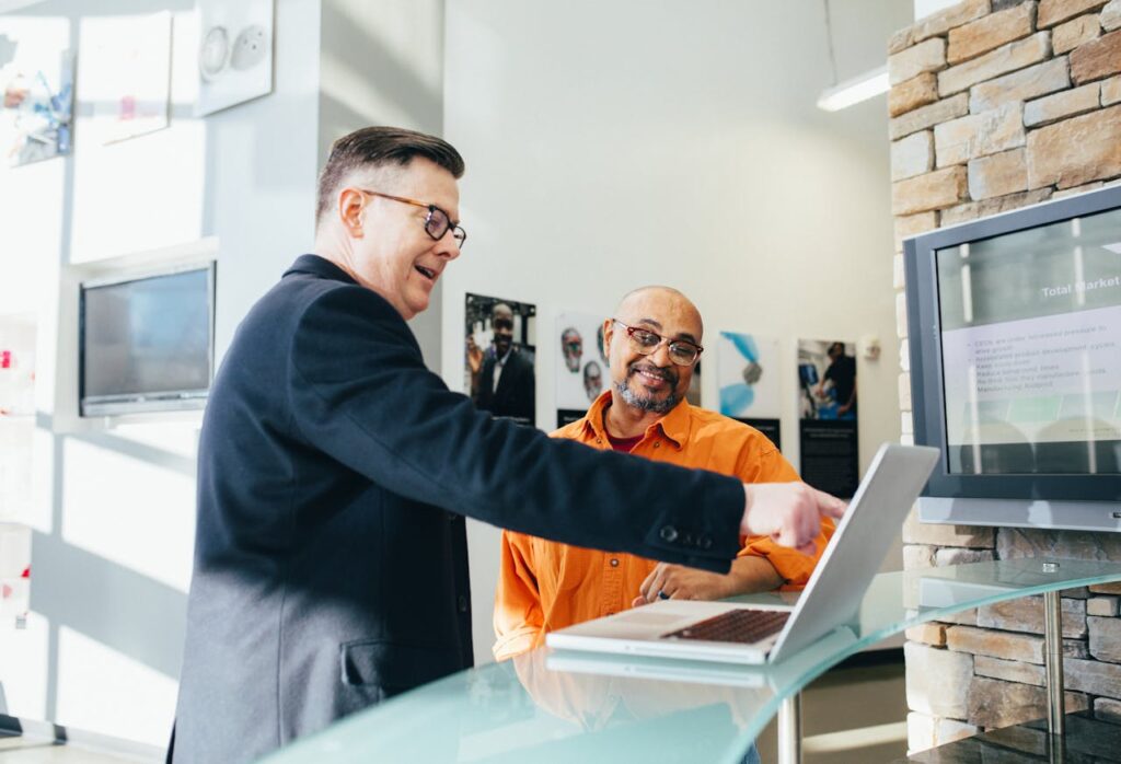 Men Happy on Laptops